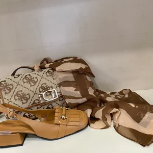 Epochè XI Venice 70 slingback donna a tacco medio in pelle cuoio con morsetto oro e frangie