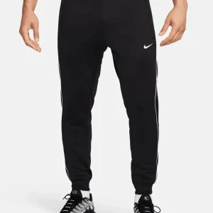 Pantalone Nike jogger in acetato nero con profili e swoosh bianco