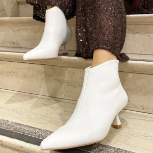 Tronchetti a punta con cerniera dietro