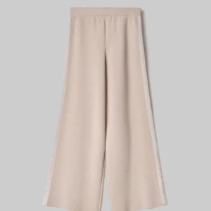 Pantalone in maglia a palazzo con logo in punto rovescio beige- HINNOMINATE