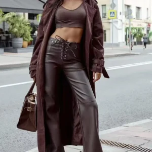 Pantaloni in ecopelle a zampa